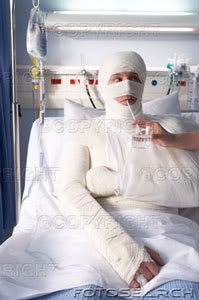 man-wrapped-in-bandages-drinking-wa.jpg