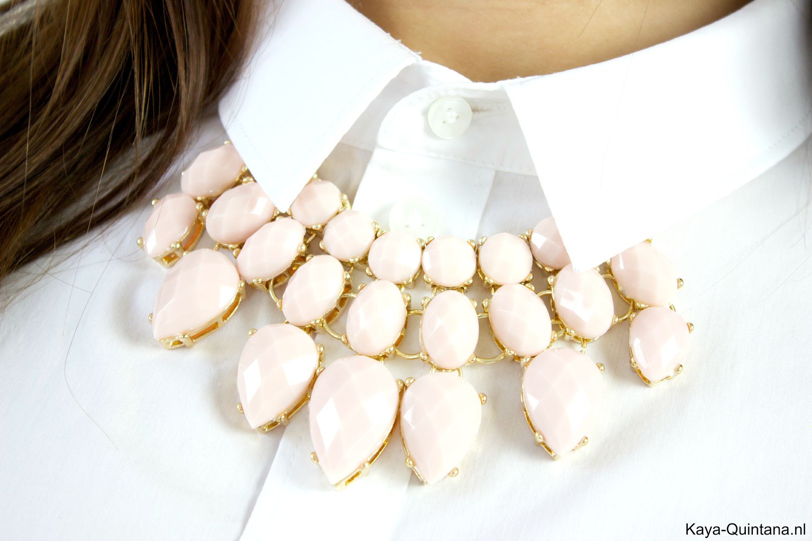 white blouse with necklace