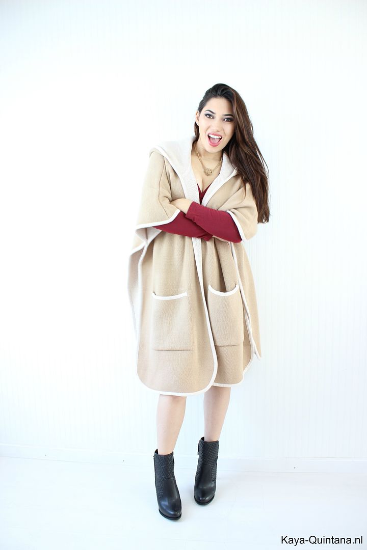 cape coat with pockets