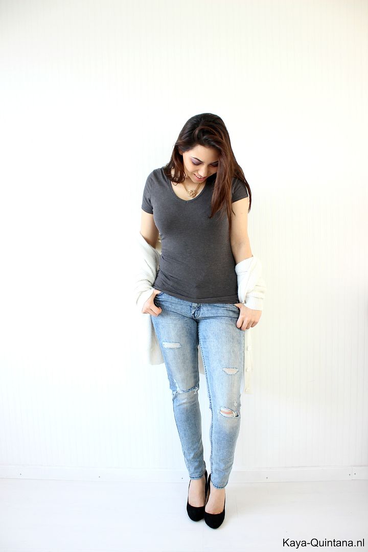 outfit met ripped jeans