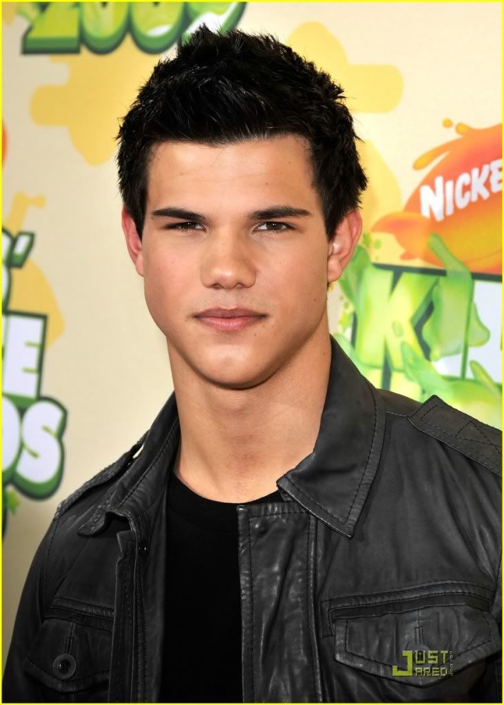 http://i232.photobucket.com/albums/ee236/shadowma1771/Twilight/taylor-lautner-kids-choice-award-2.jpg